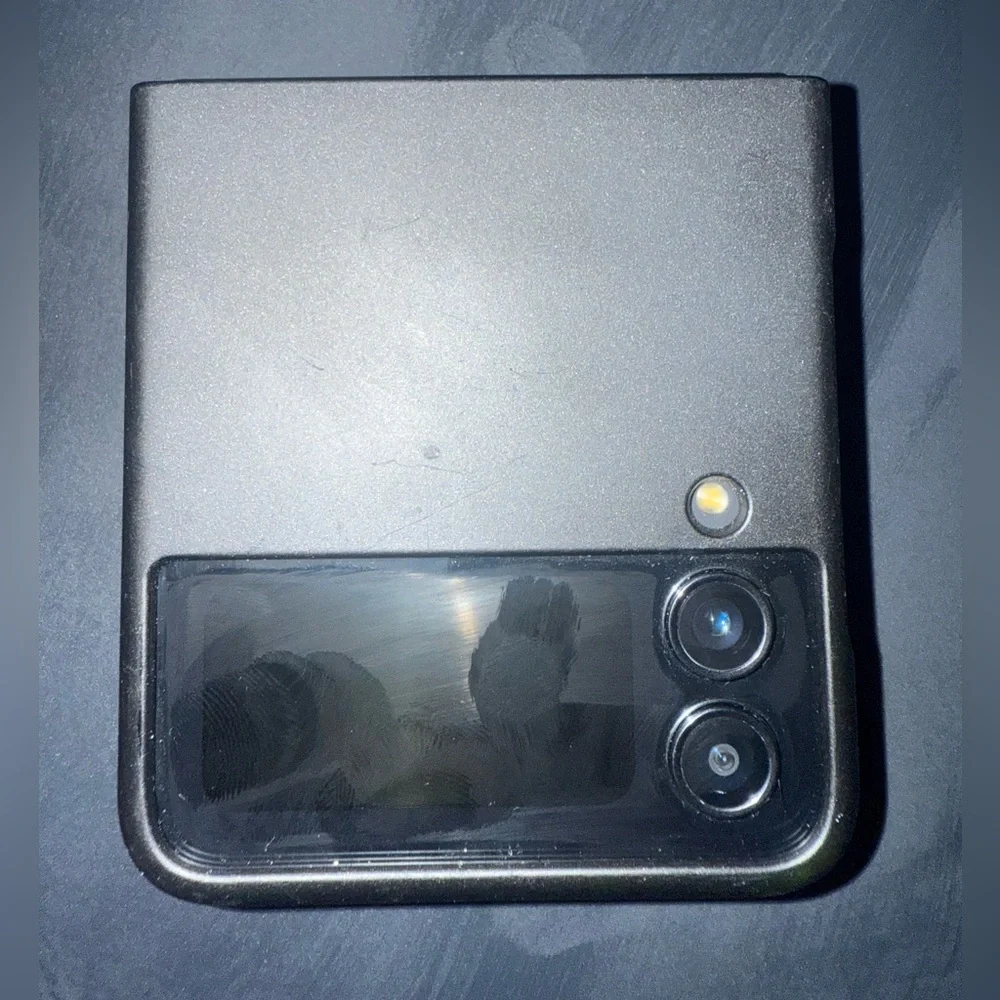 Black Foldable Smartphone with Blue Display